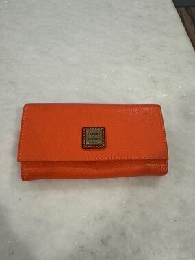 Dooney & Bourke Orange Pebbled Leather Flap Clutch Wallet